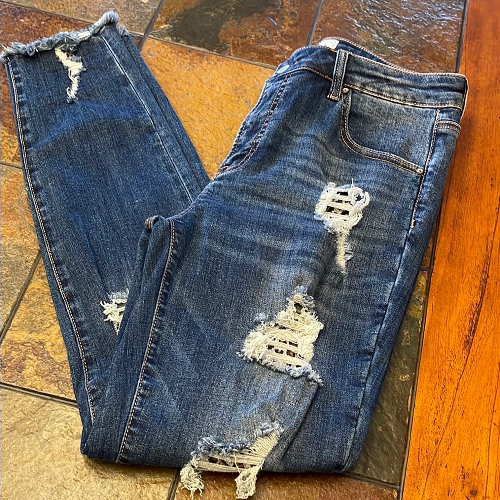 Blue Boyfriend Jeans with Distressed Rips and Frayed Edges